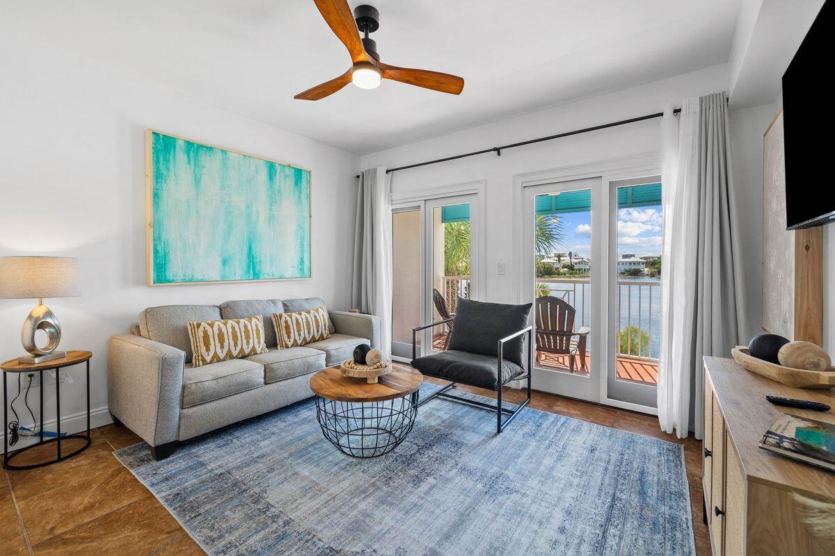 a living room with furniture and a window