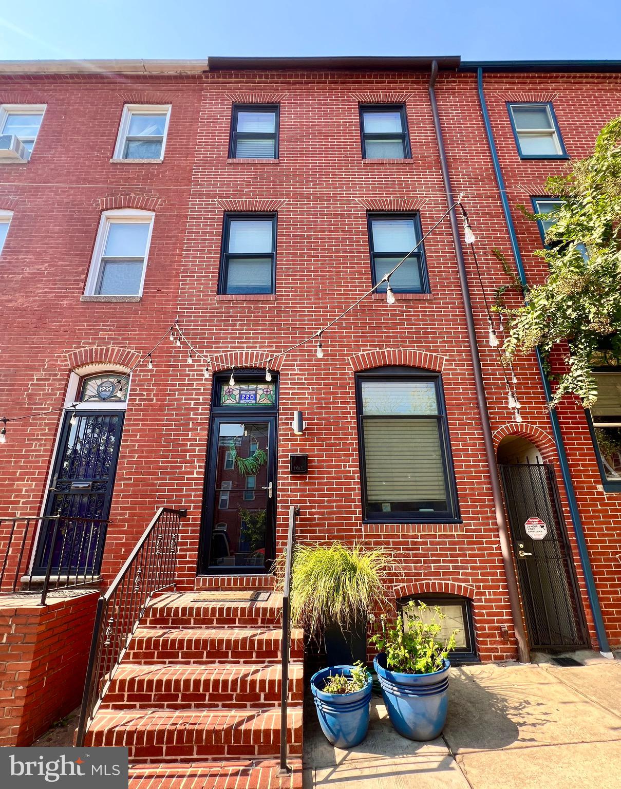 a front view of a multi story residential apartment building