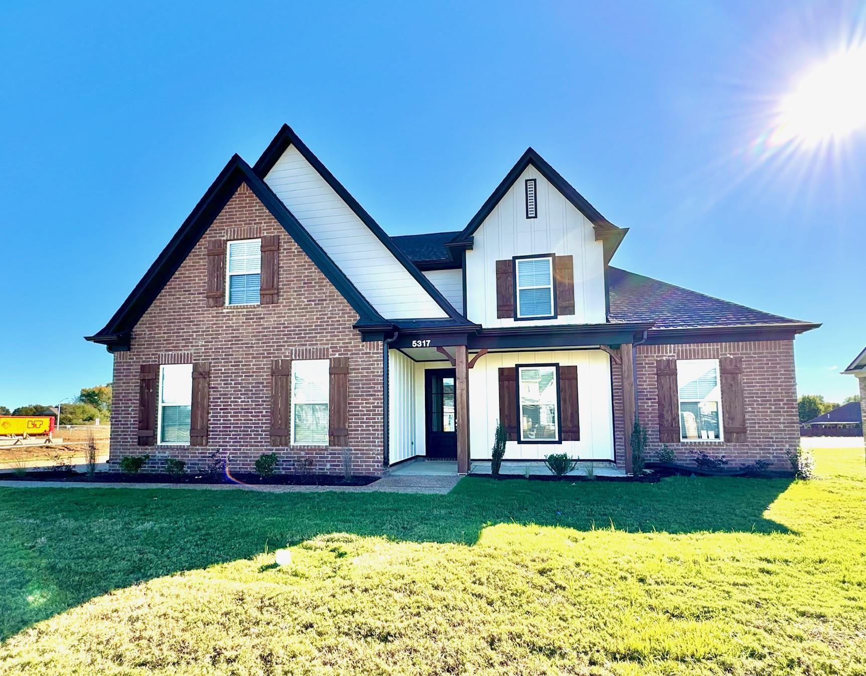 View of front of house with a front yard