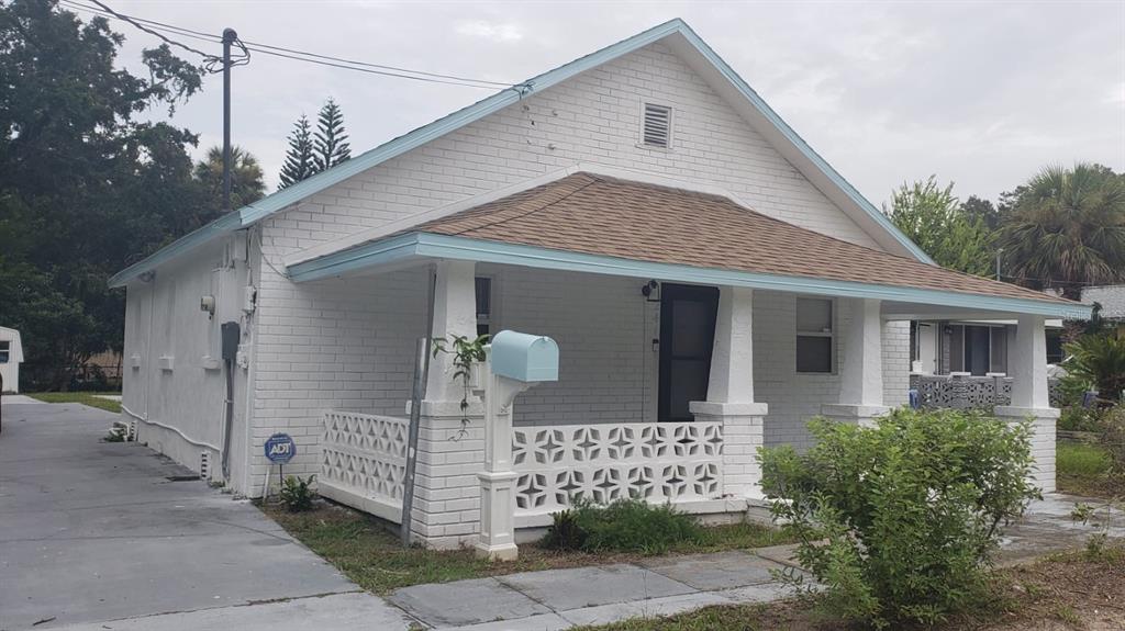 a front view of a house with a garage