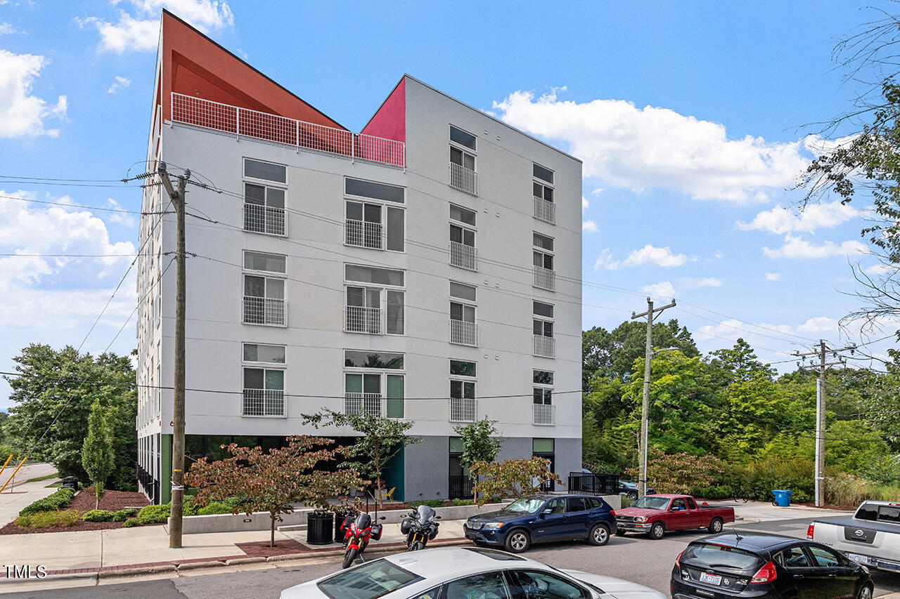 a front view of a building with street view