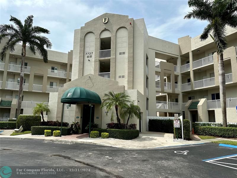 a front view of a building with street