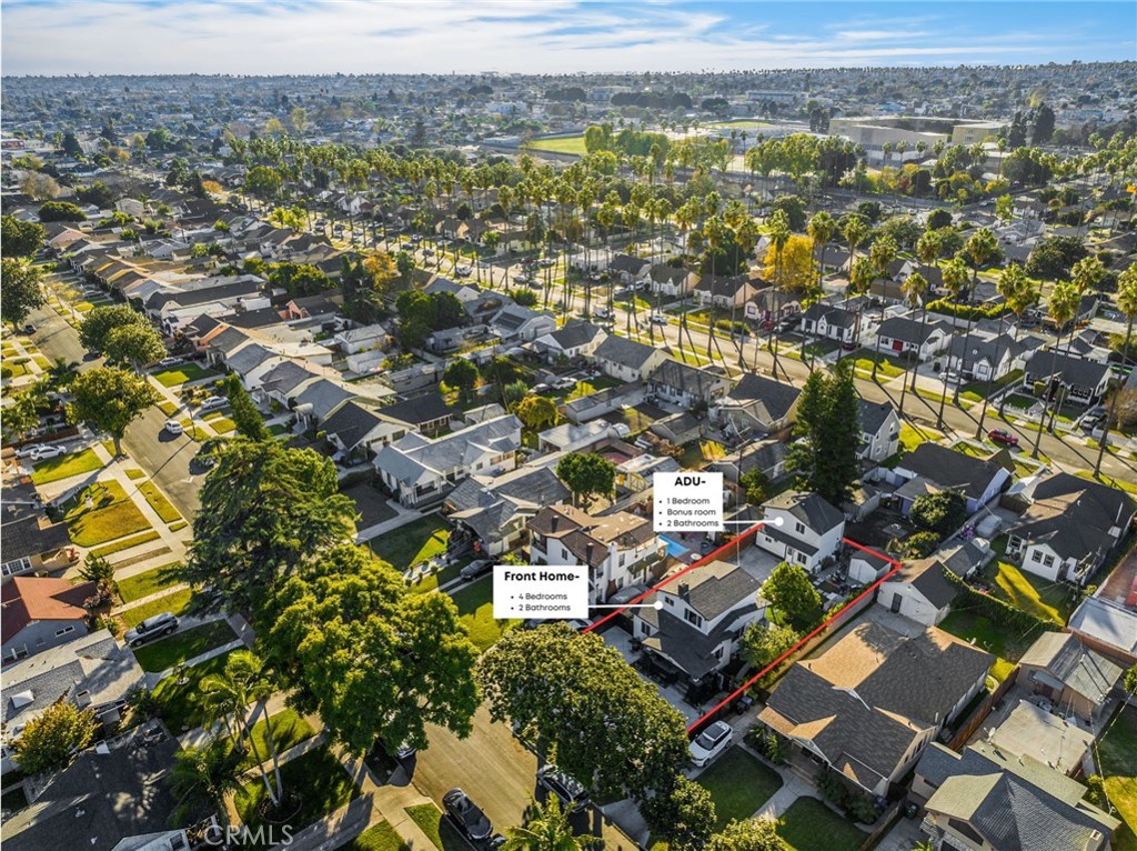 an aerial view of residential building with parking space