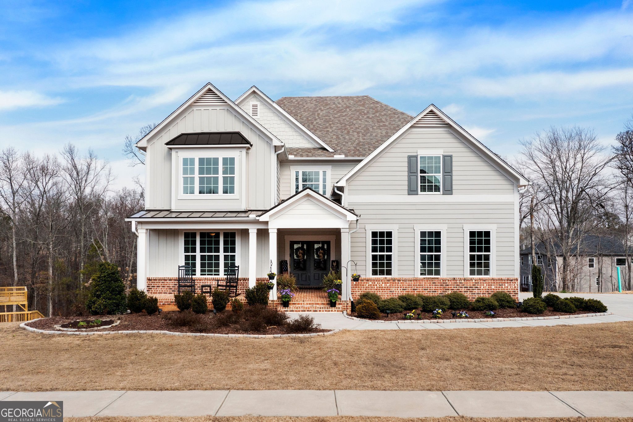 front view of a house with a yard