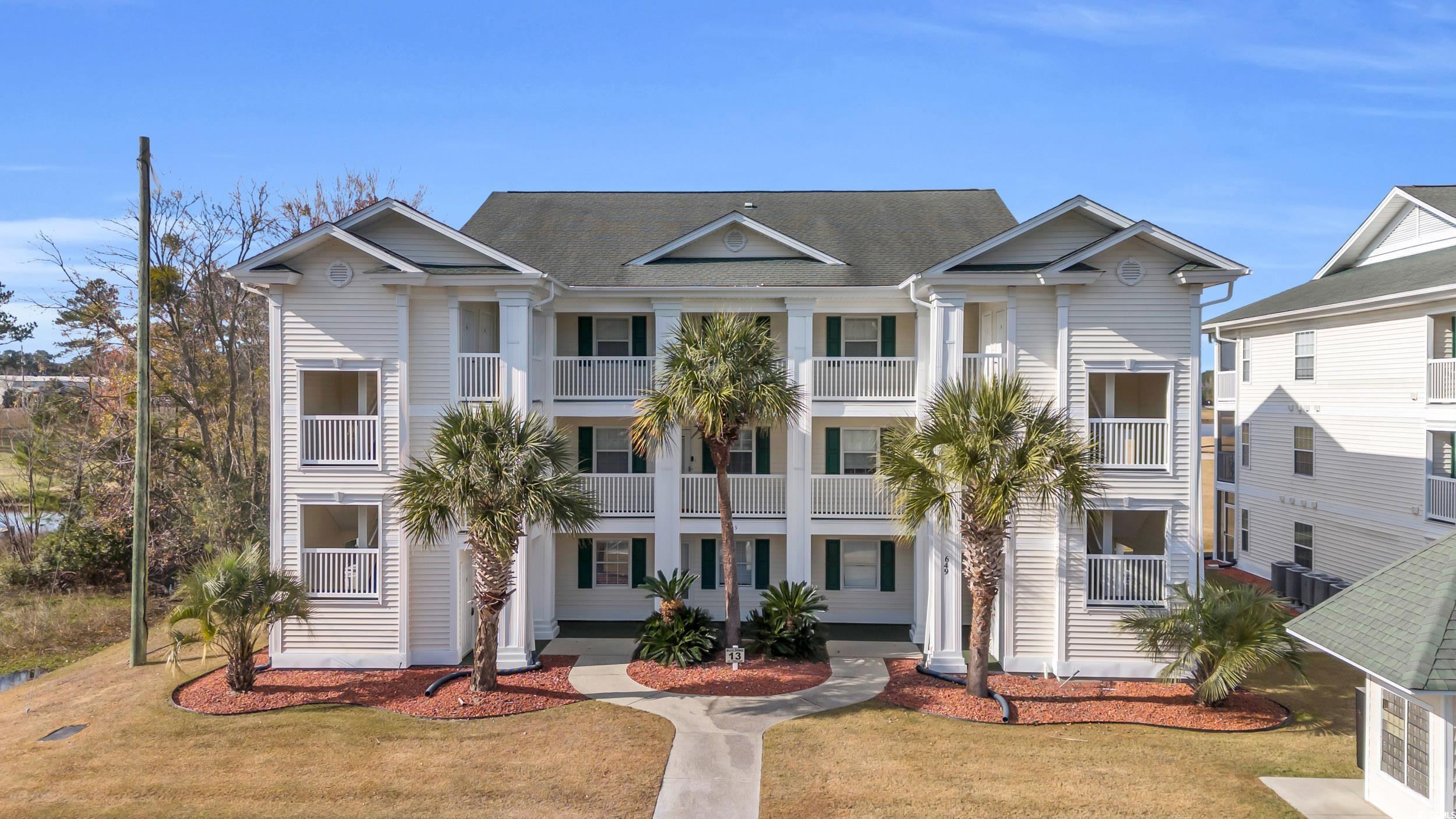 View of front of house with a front lawn