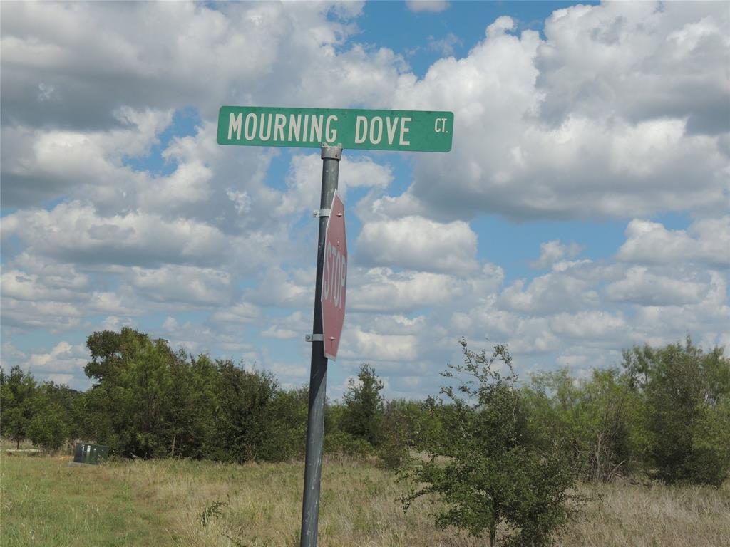 a street sign that is sitting in the middle of a building