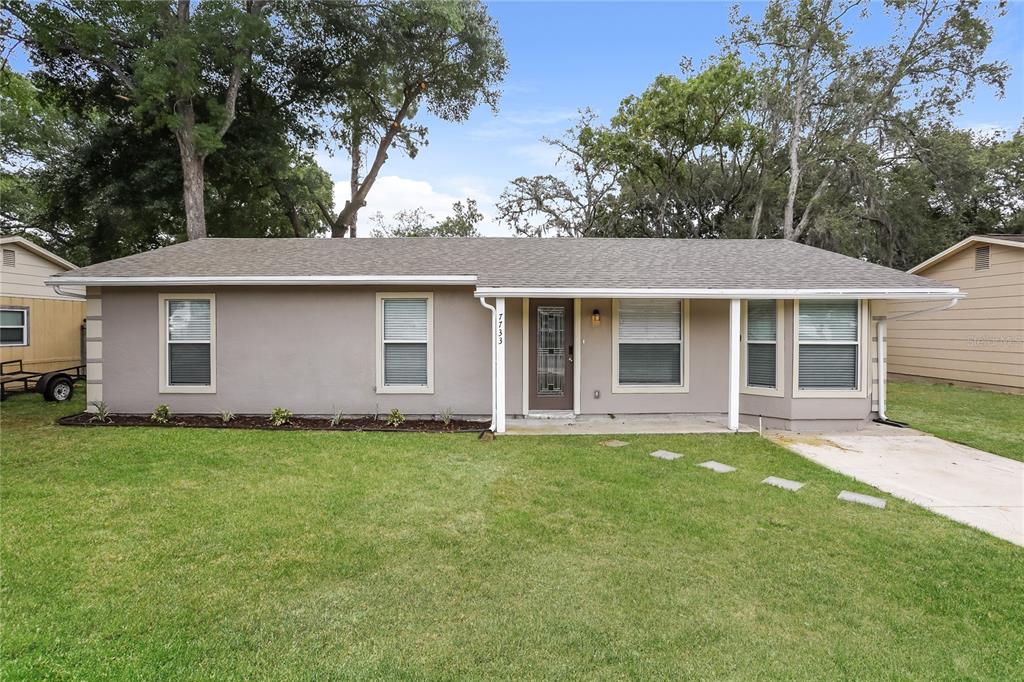 front view of a house and a yard