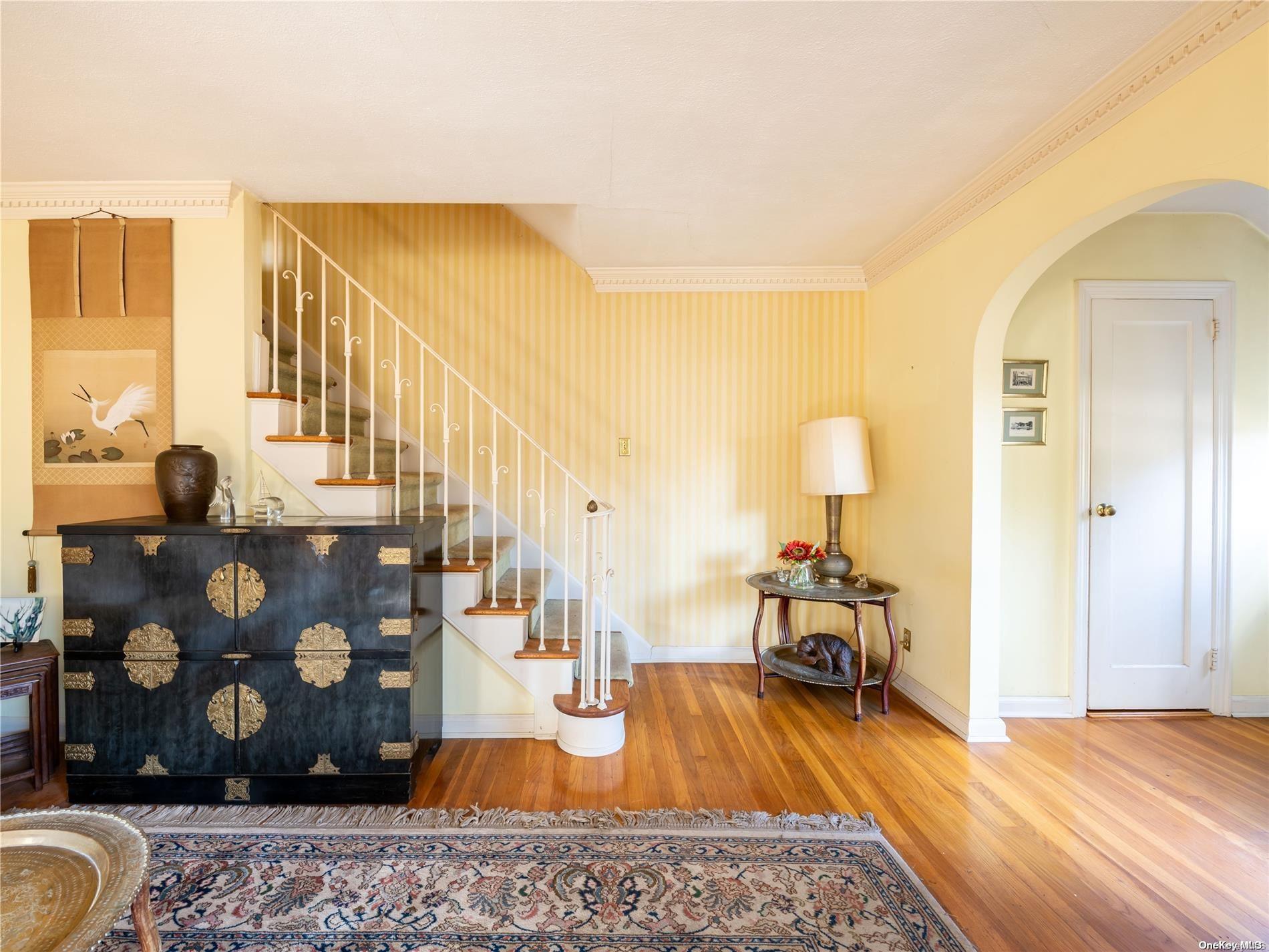 a view of a living room and bathroom