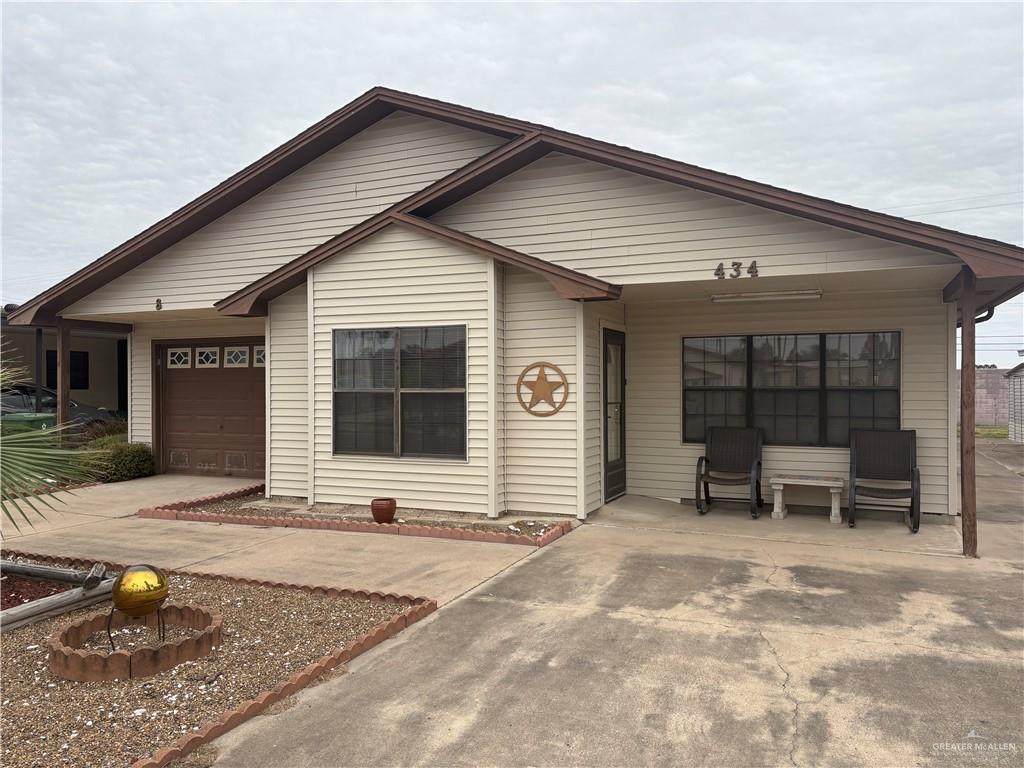 Ranch-style home with a garage