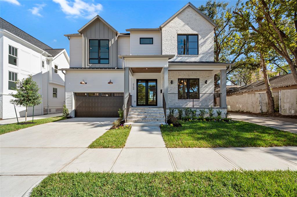 Gorgeous new home built by Modern Heights Homes on wide street in Woodland Heights with walking distance to bike trail and Travis elementary