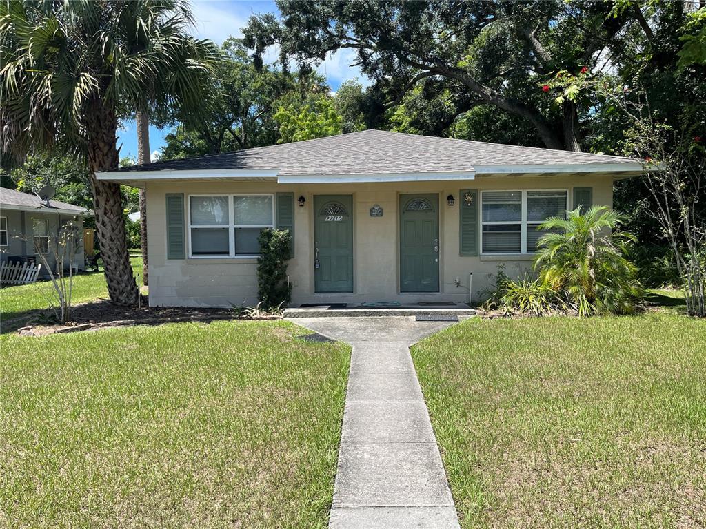 front view of a house with a yard