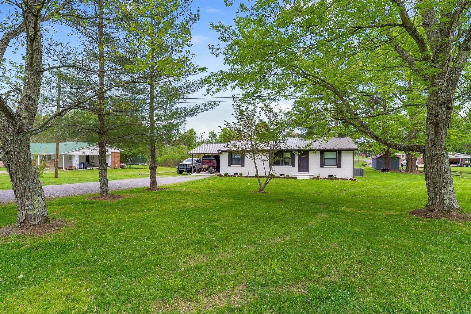 a view of a house with a big yard