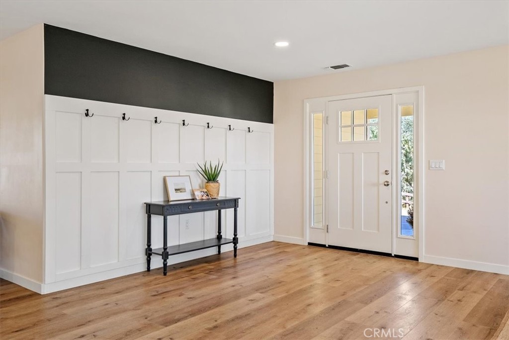 a view of a livingroom with wooden floor