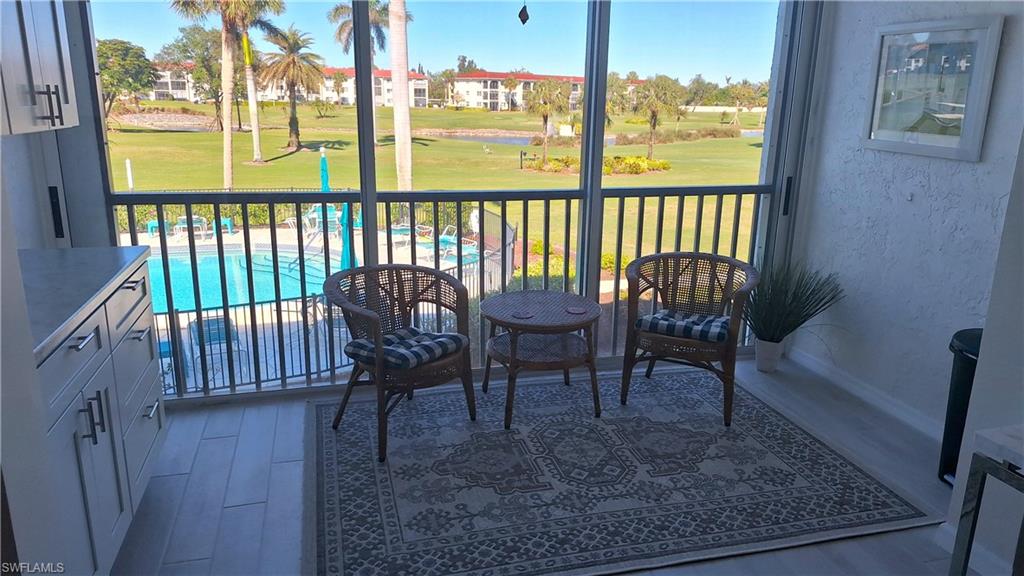 a view of a porch with furniture