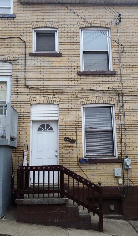 a view of house with windows