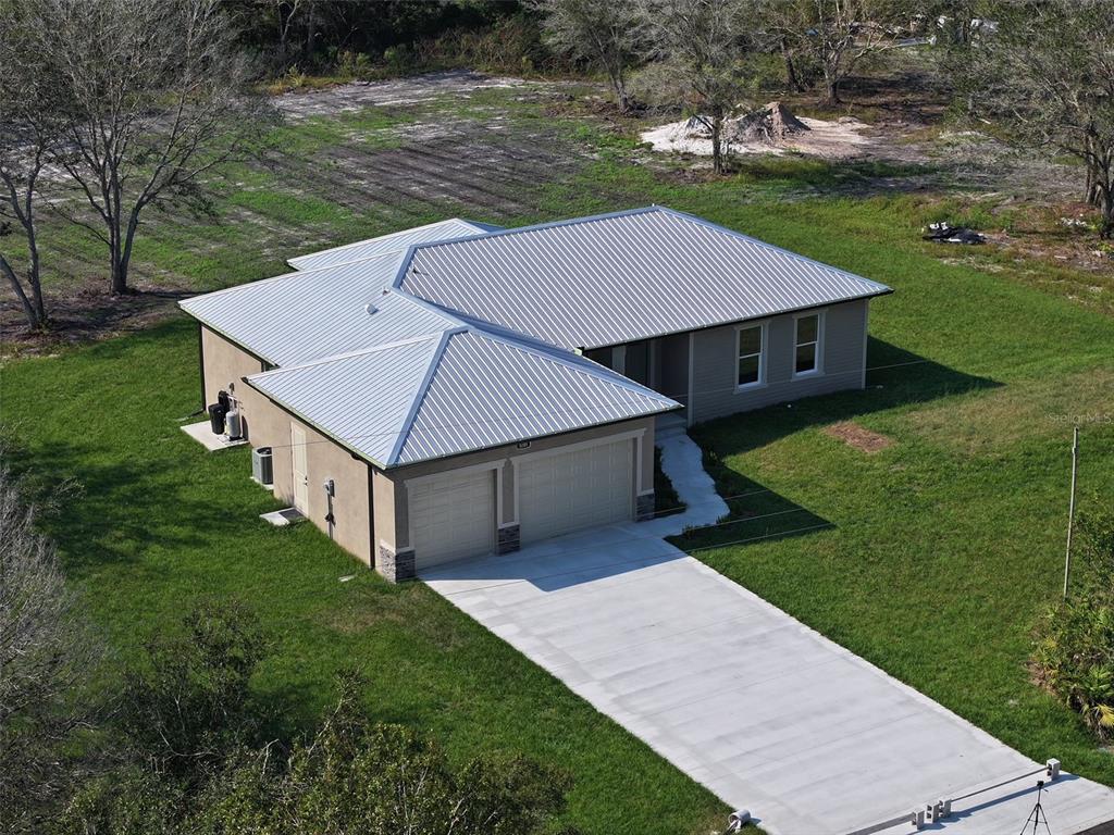 a view of a backyard with a garden