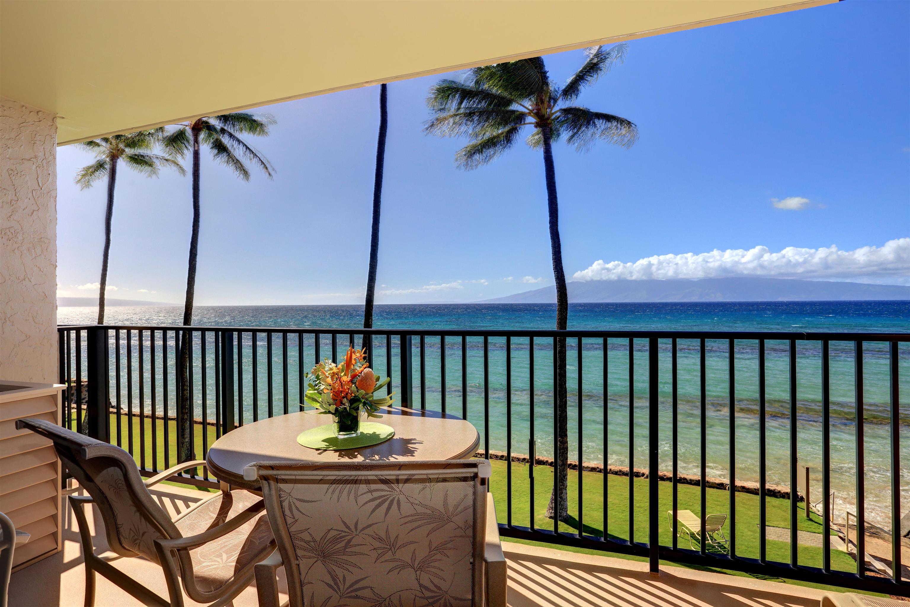 a view of a balcony dining area