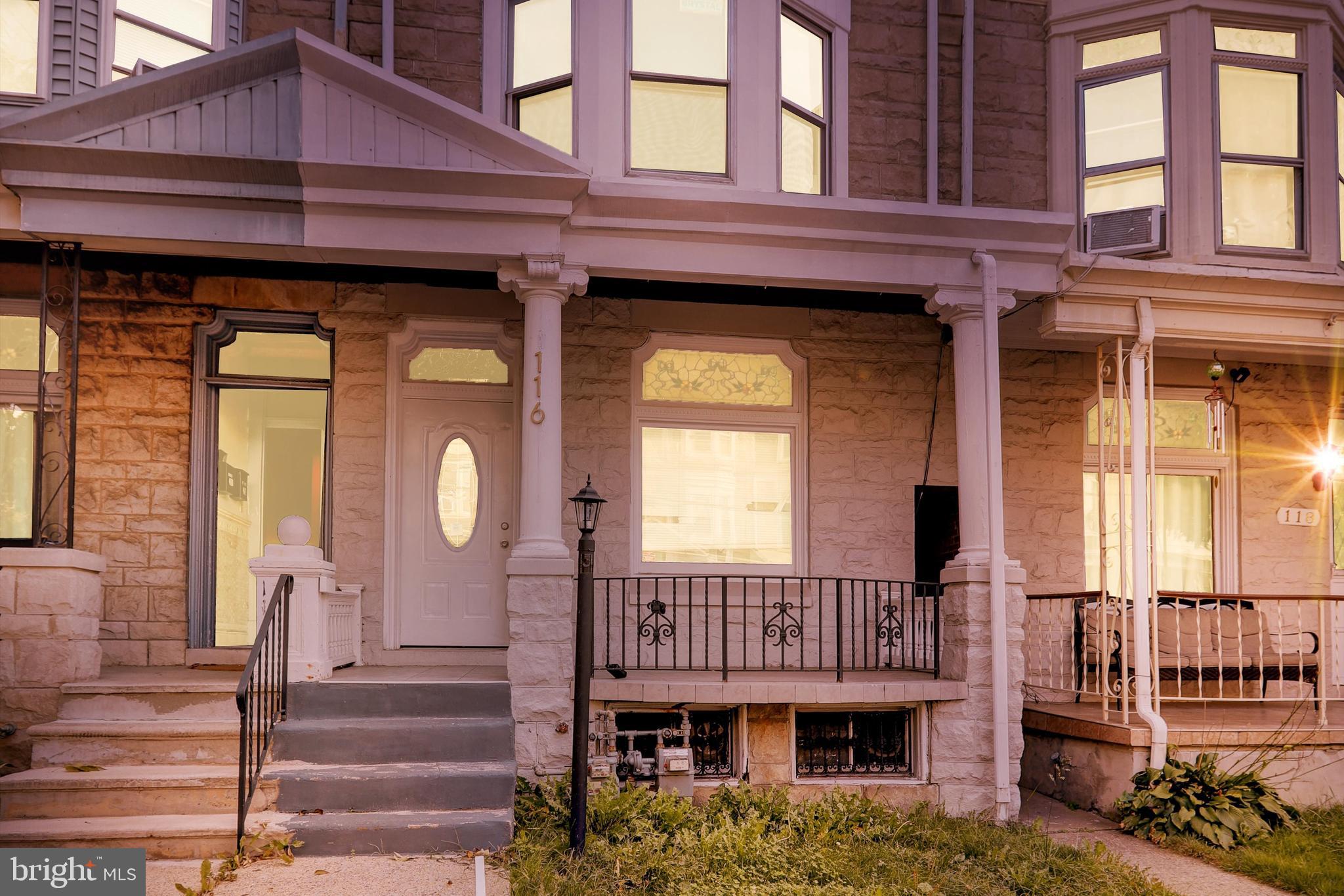 a front view of a house with a porch