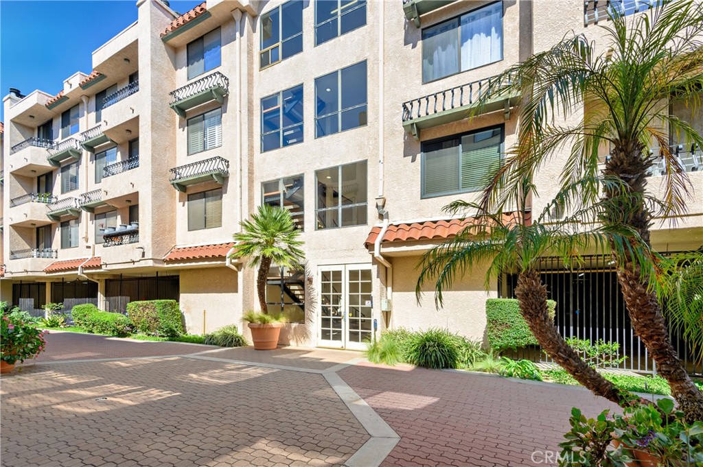 a front view of a multi story residential apartment building