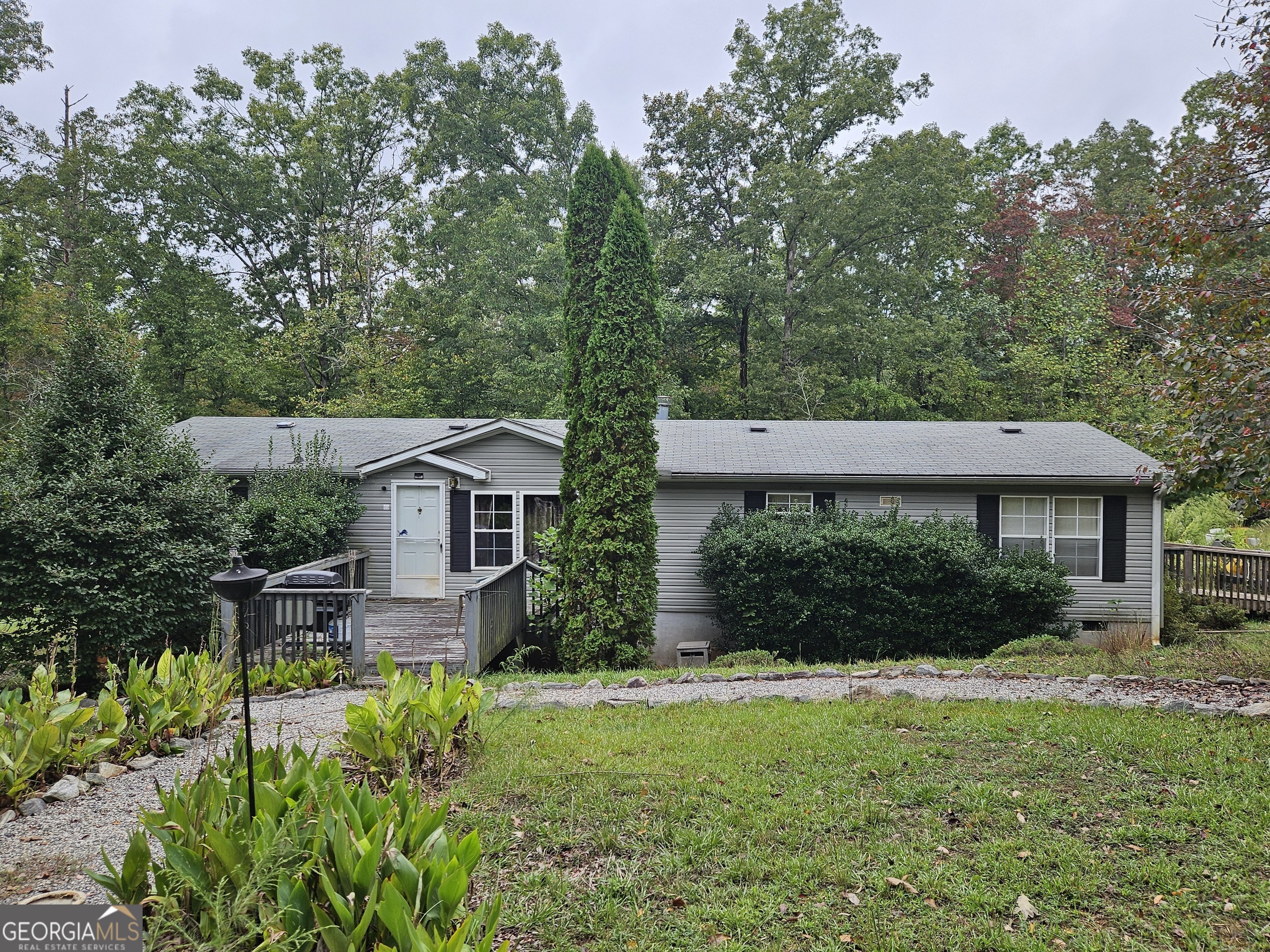 a house view with a garden space