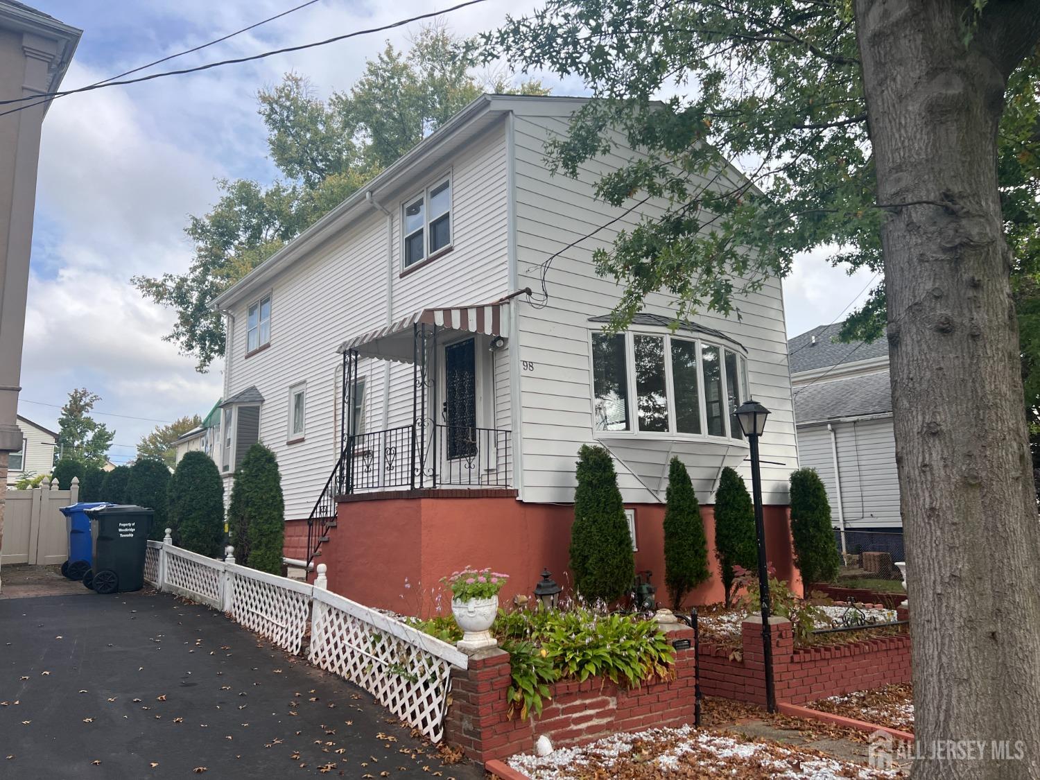 a front view of a house with balcony