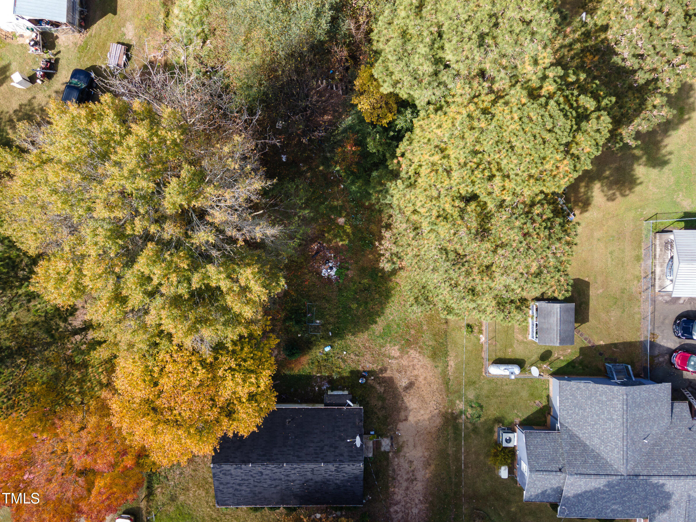 a view of a house with a tree