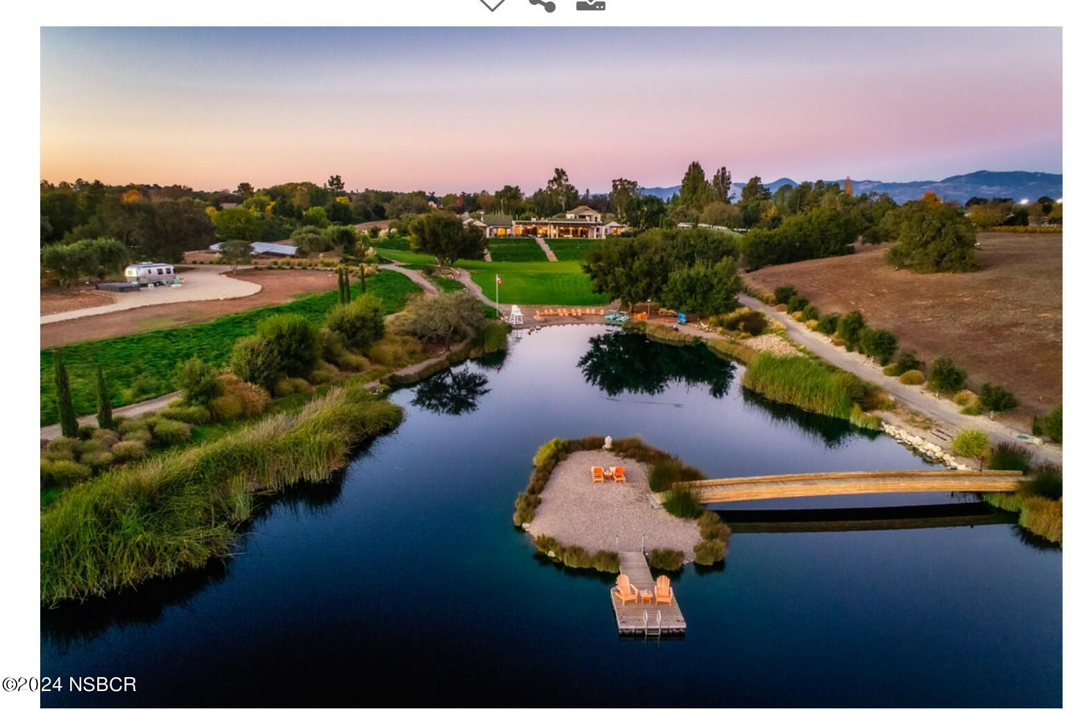 an aerial view of lake residential houses with outdoor space and lake view