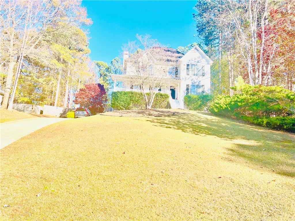 a view of a house with a swimming pool