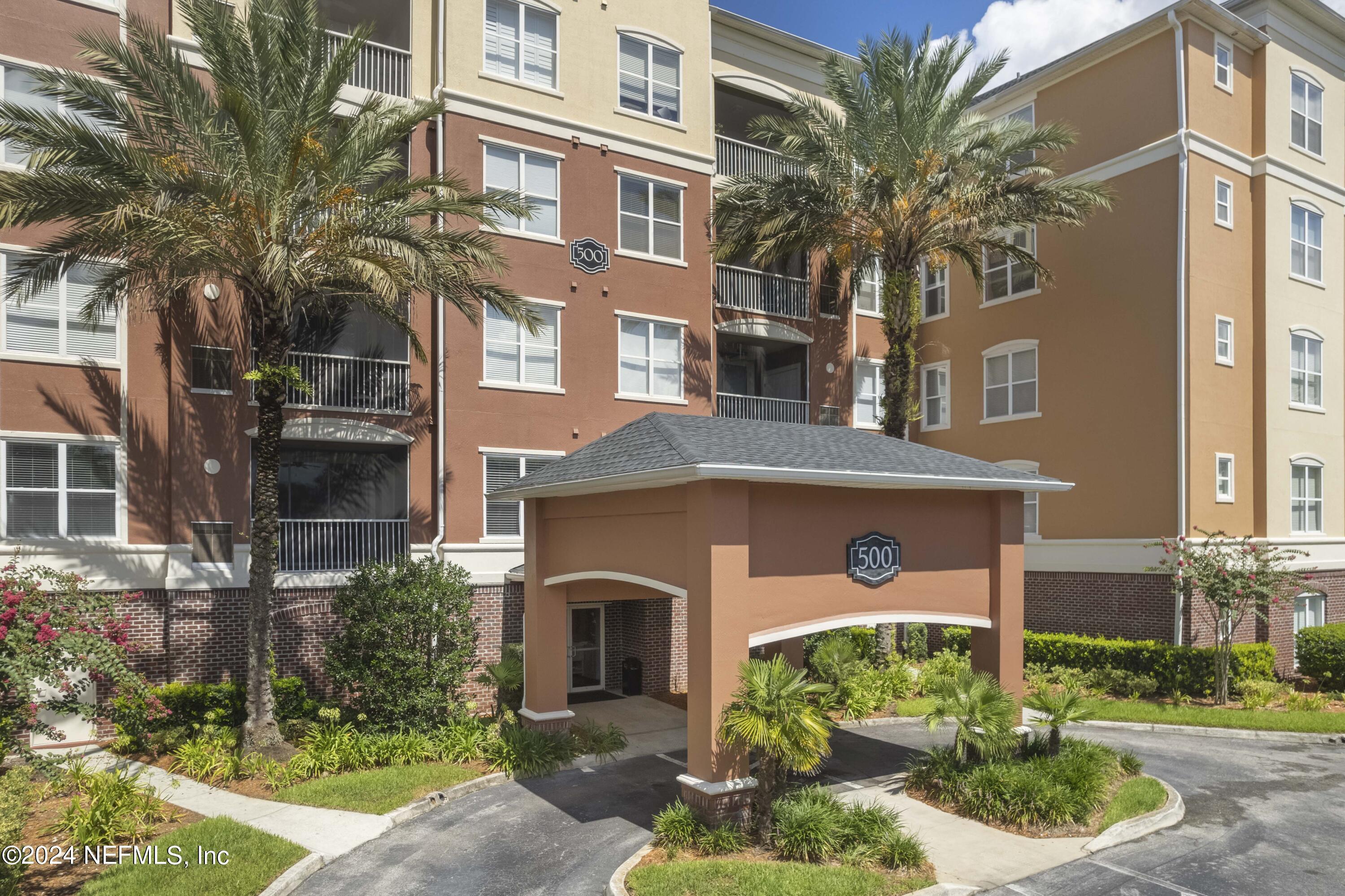 a front view of a multi story residential apartment building