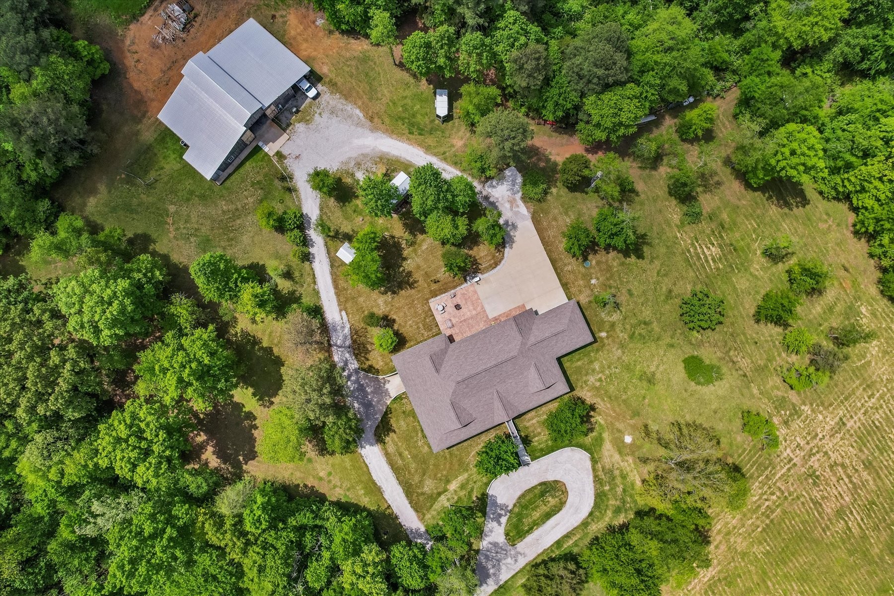 an aerial view of house with yard