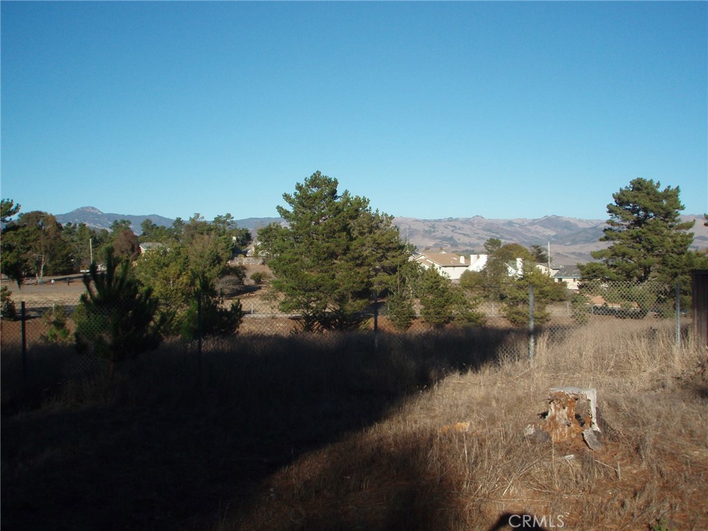 a view of lake with green space