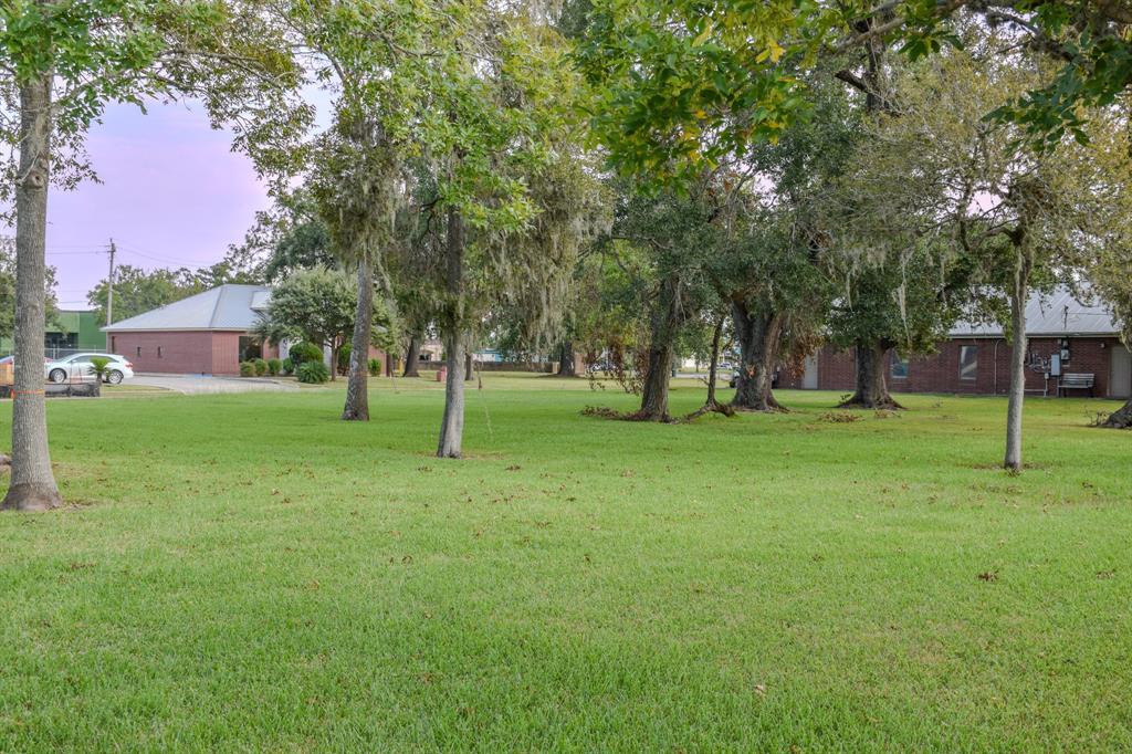 a view of field with green space