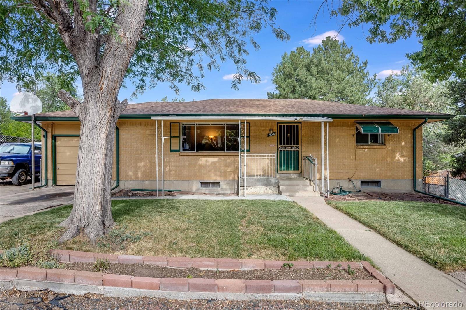 front view of a house with a yard