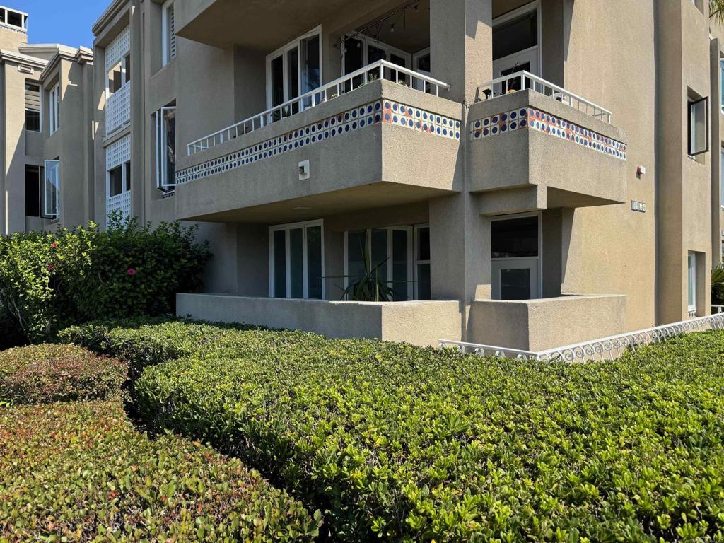 a view of a building with a garden