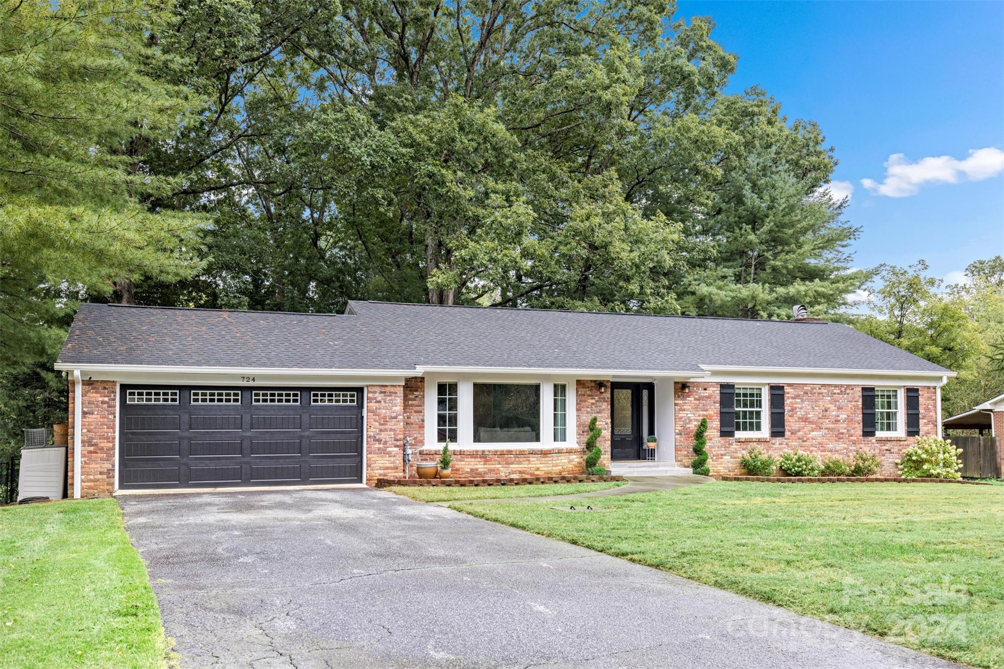 front view of a house and a yard