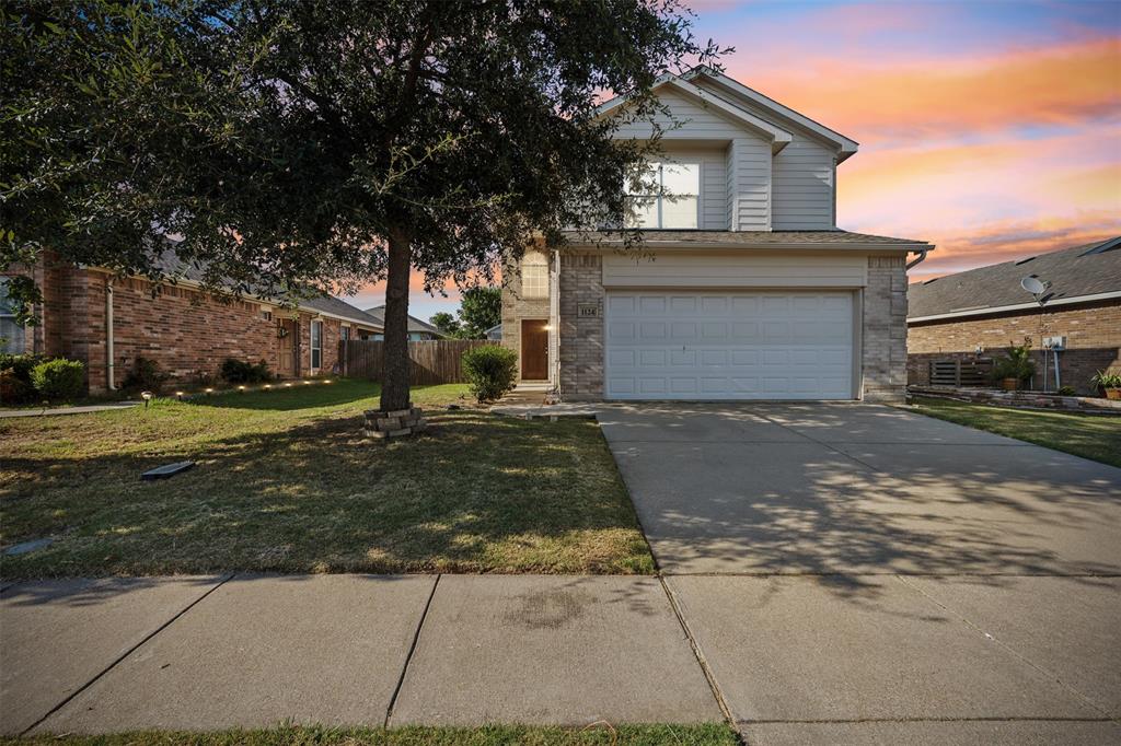 a front view of house with yard