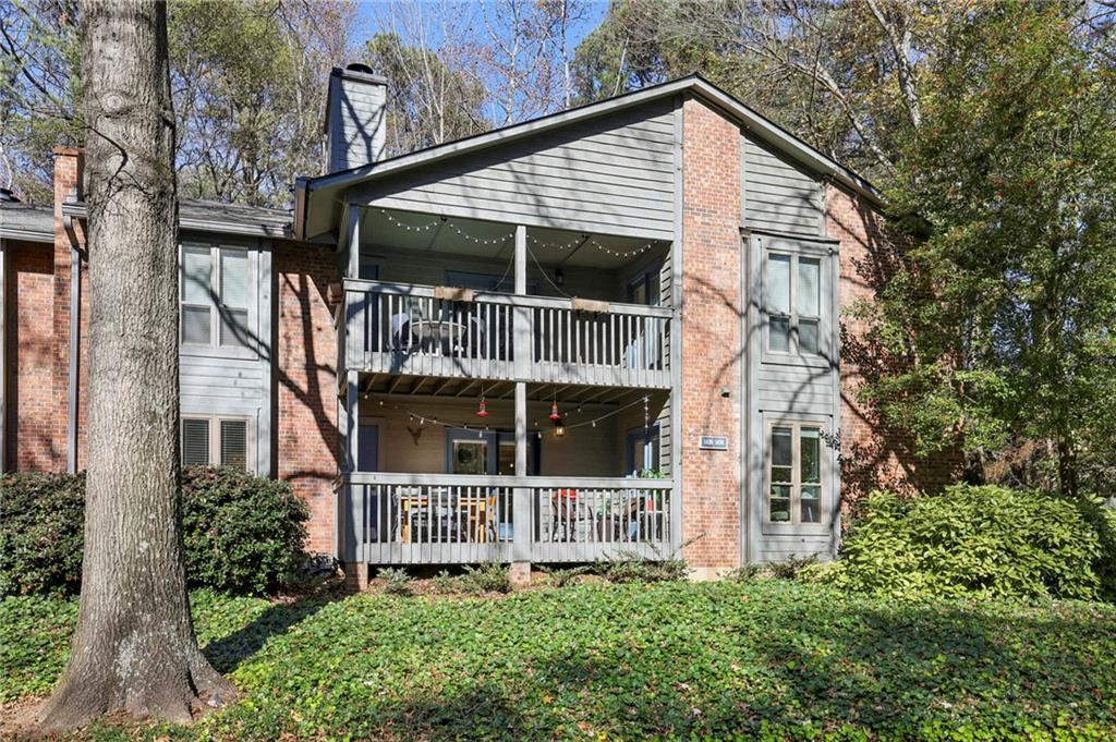 a view of front of house with a small yard