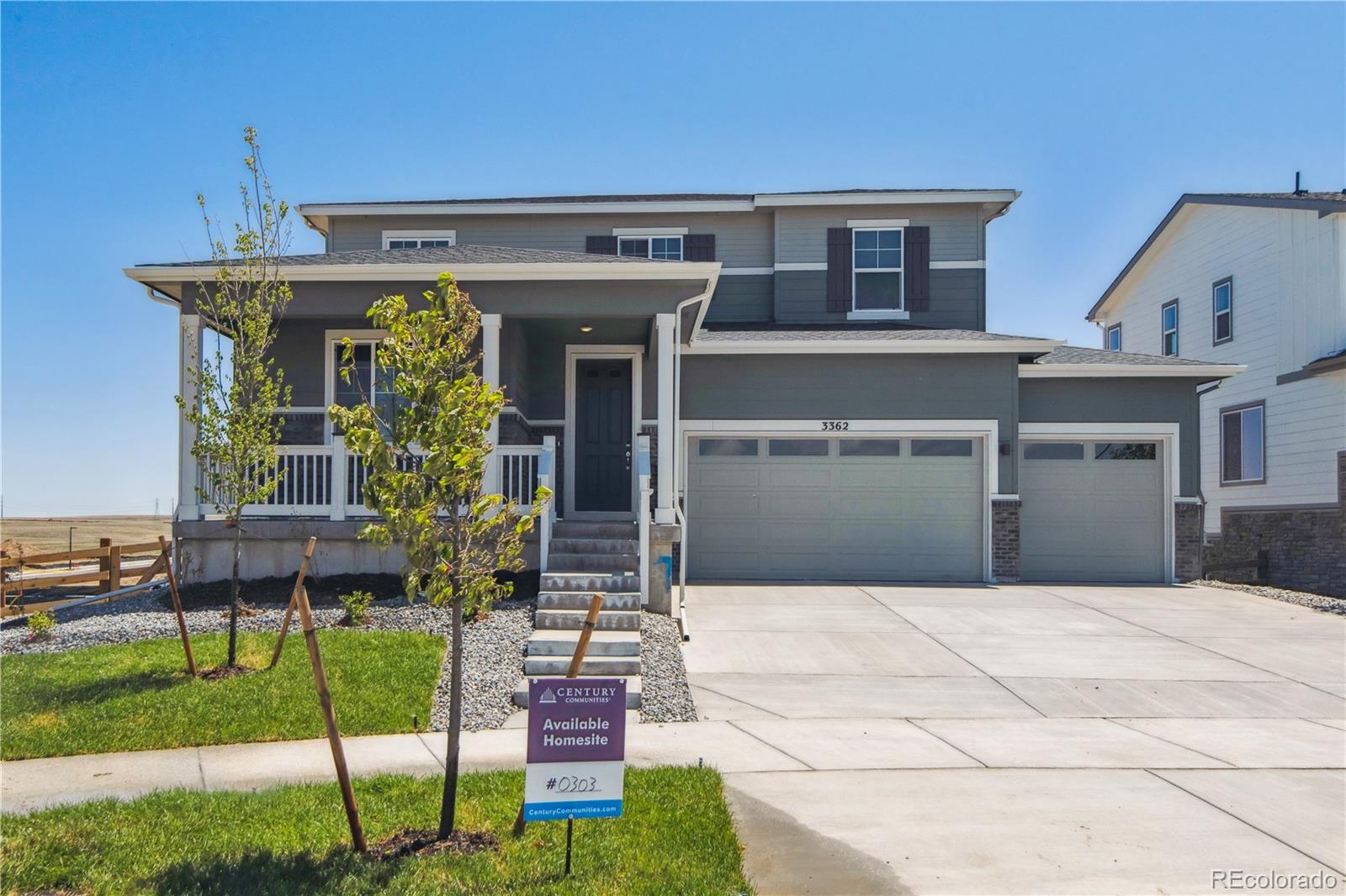 a front view of house with an outdoor seating