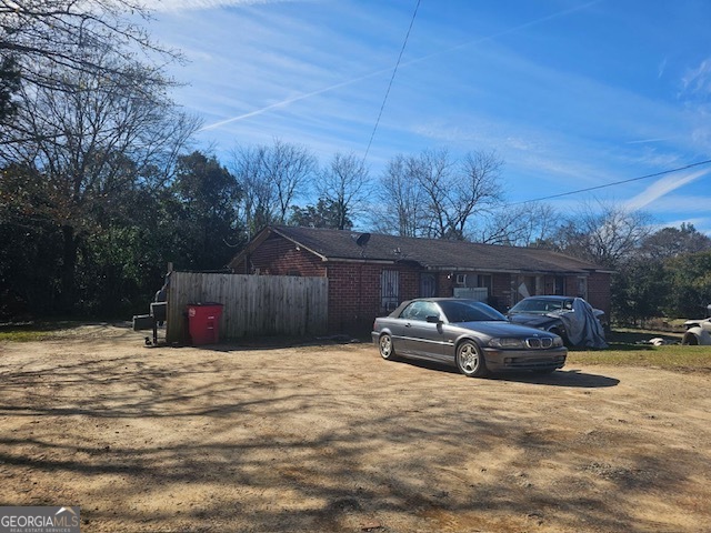 a view of pool with a yard