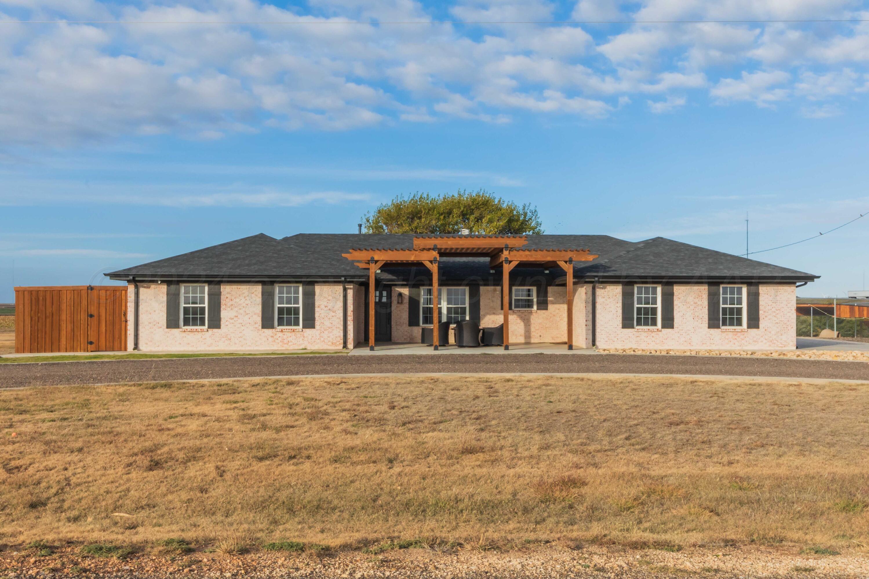 front view of house with a yard