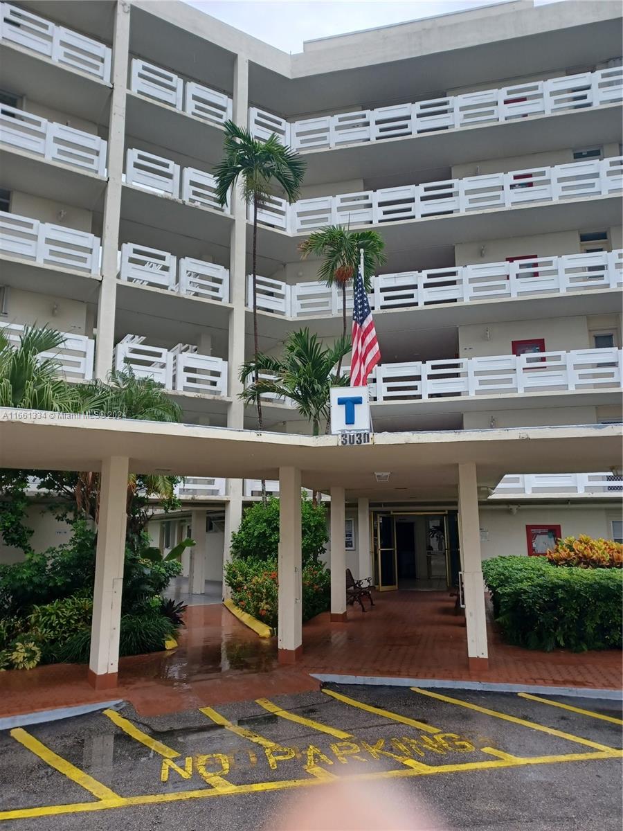 a view of a building with a porch