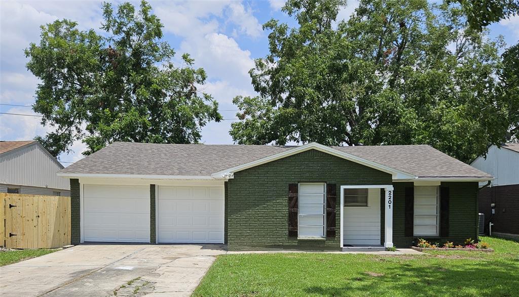 front view of a house and a yard