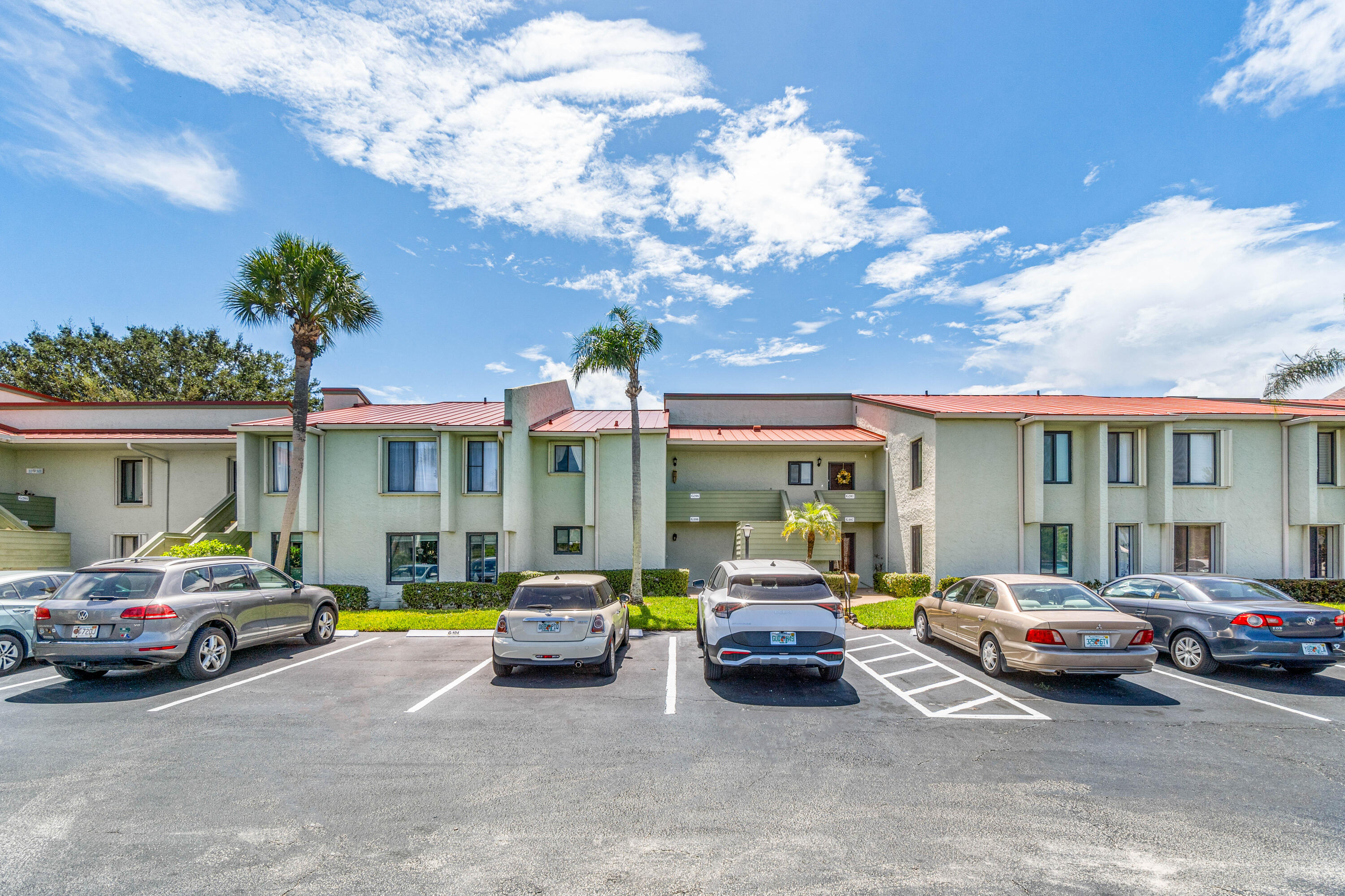 a view of a cars parked in front of a building