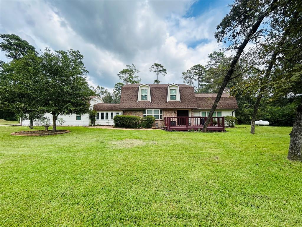 a view of a house with a big yard