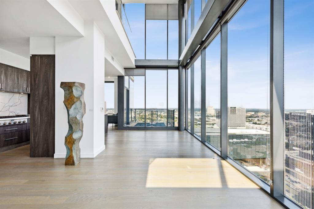 a view of an entryway with a floor to ceiling window