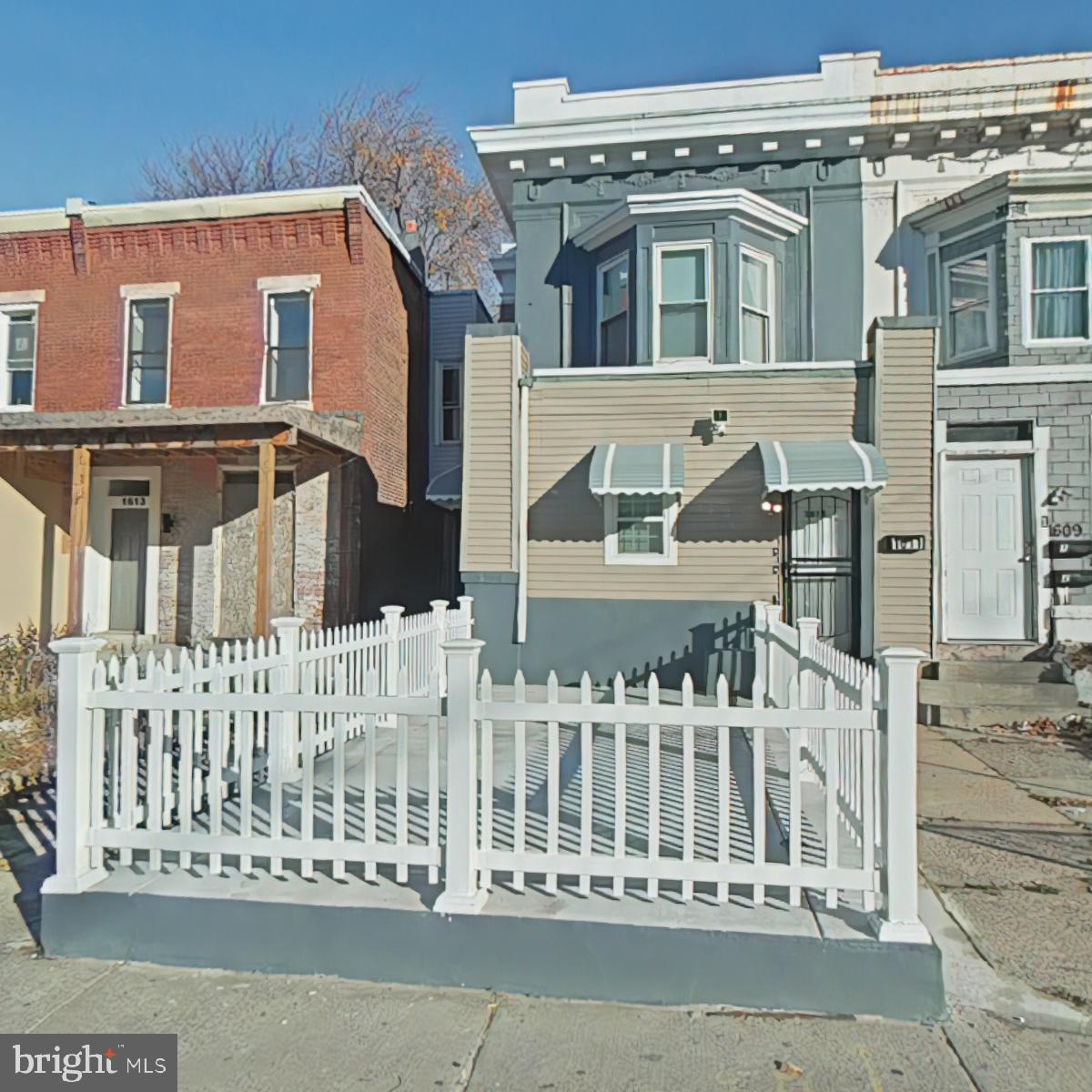 front view of a house with a street