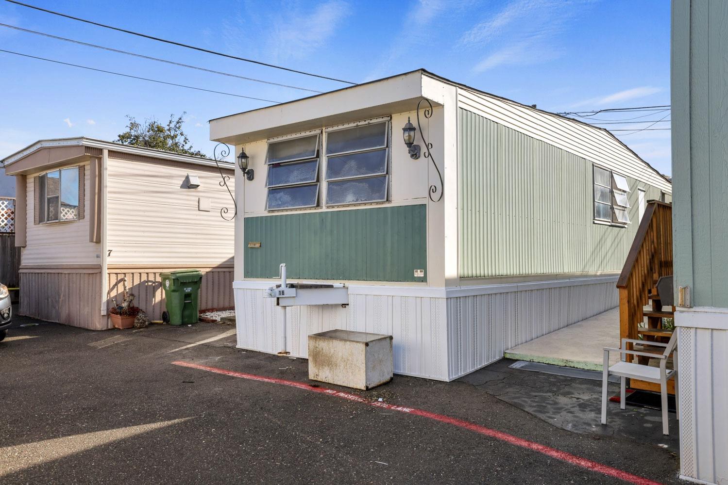 a front view of a house with garage