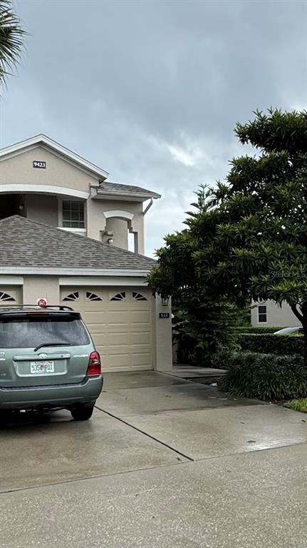 a car parked in front of a house