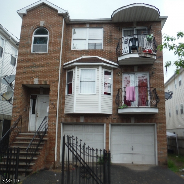 a front view of a house with a balcony