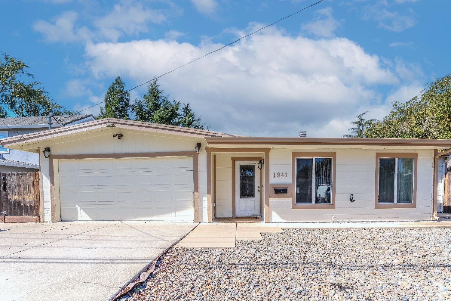 front view of house with a yard